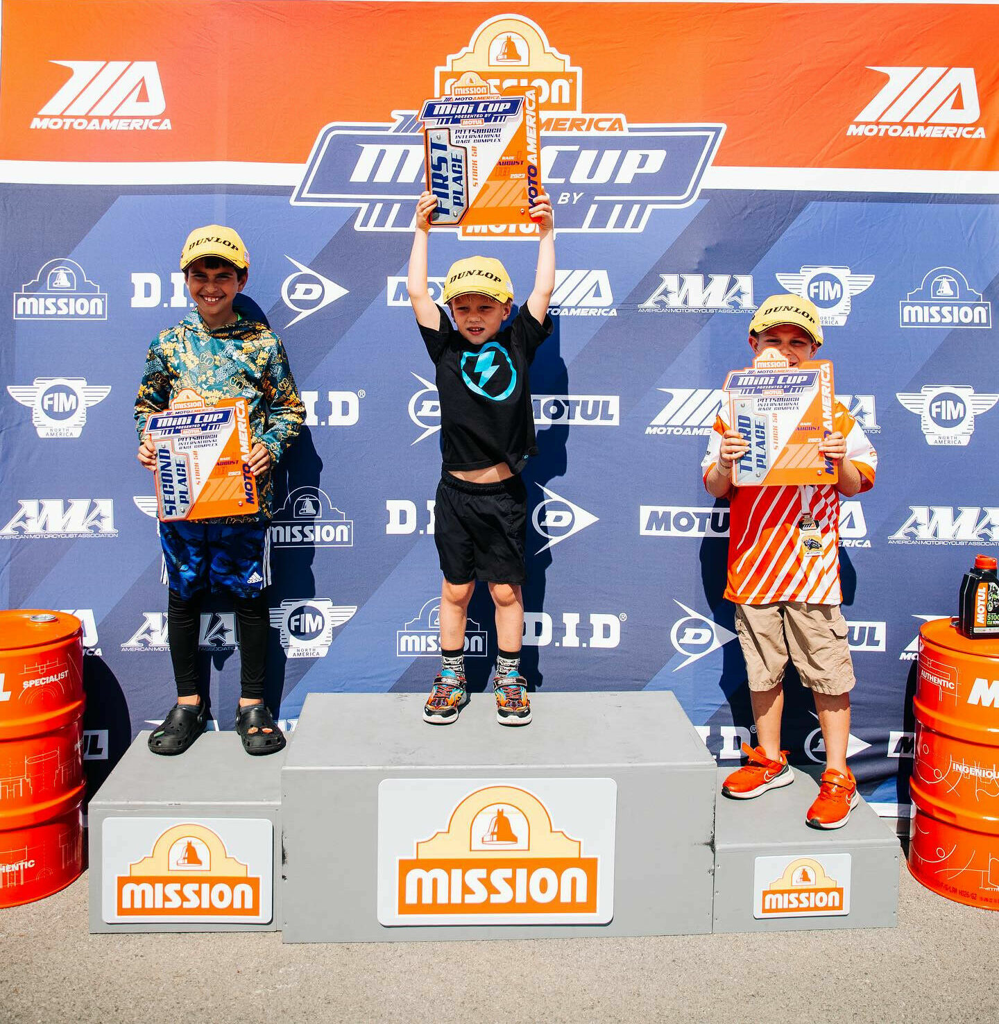 Stock 50 race winner Cruise Texter (center), runner-up Christian Berlowitz (left), and third-place Westin Fager (right). Photo courtesy MotoAmerica.