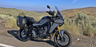 Yamaha's 2024 Tracer 9 GT+, resting on an Idaho back road, is loaded with technology that helps the machine do what it does best - eat miles on the open road and perform in the twisties. Photo by Michael Gougis.