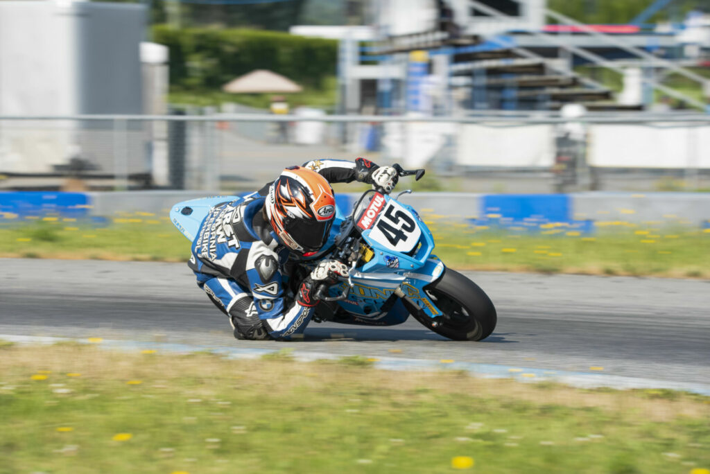 Misti Hurst's son Ashton Parker (45) running 45 as tribute to the late Peter Lenz. Photo by William Snow Photography.