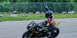 Ian Beam (340) celebrates his Dash for Cash/Middleweight GP race victory at New Hampshire Motor Speedway. Photo by Martin Hanlon, courtesy NEMRR.