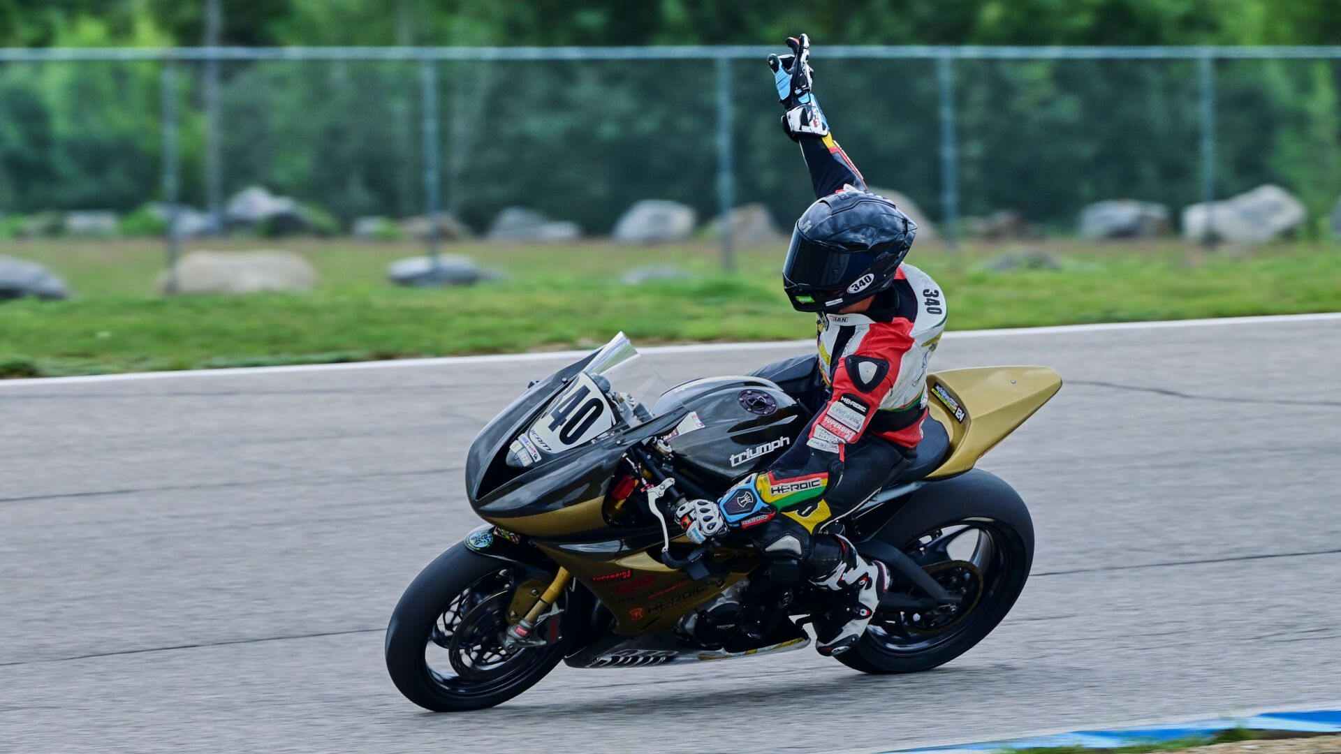 Ian Beam (340) celebrates his Dash for Cash/Middleweight GP race victory at New Hampshire Motor Speedway. Photo by Martin Hanlon, courtesy NEMRR.