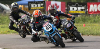 Ashton Parker (45) leading an FIM MiniGP Canada race in Ontario. Photo by Colin Fraser.