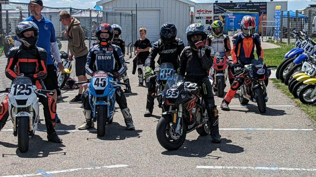 Young racers waiting to go out on track on their purpose-built Ohvale racebikes. 