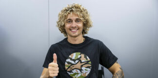 Axel Bassani with his new Kawasaki contract. Photo courtesy Kawasaki Motors Europe.