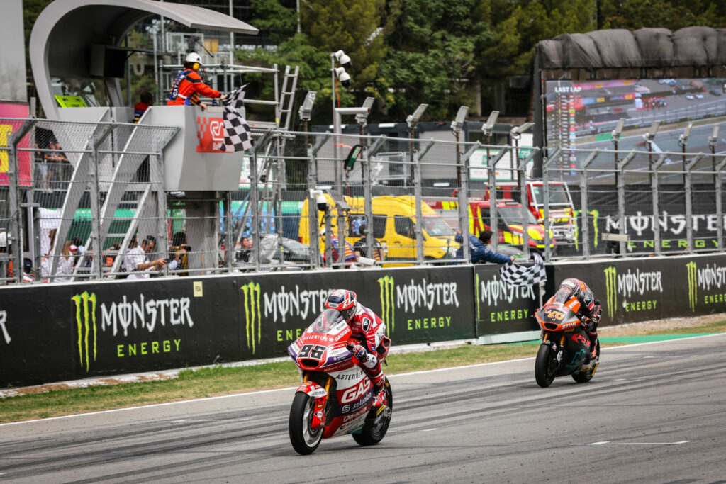 Jake Dixon (96) held off Aron Canet (40) to win the Moto2 race. Photo courtesy Dorna.