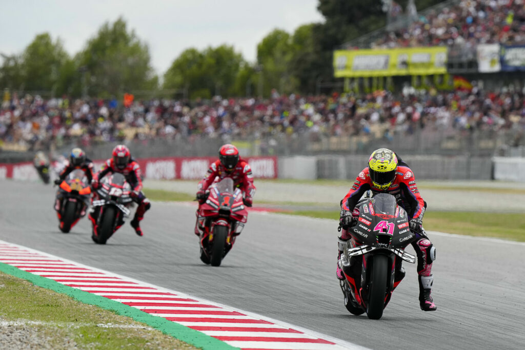 Aleix Espargaro (41) won Saturday's MotoGP Sprint Race over Francesco Bagnaia (1), Maverick Vinales (12), and Brad Binder (33). Photo courtesy Dorna.