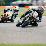 MotoAmerica Mission Mini Cup by Motul racers Michael Galvis (38) and Brayden Fager (73) in action Friday on the Liberator kart track at New Jersey Motorsports Park. Photo courtesy MotoAmerica.