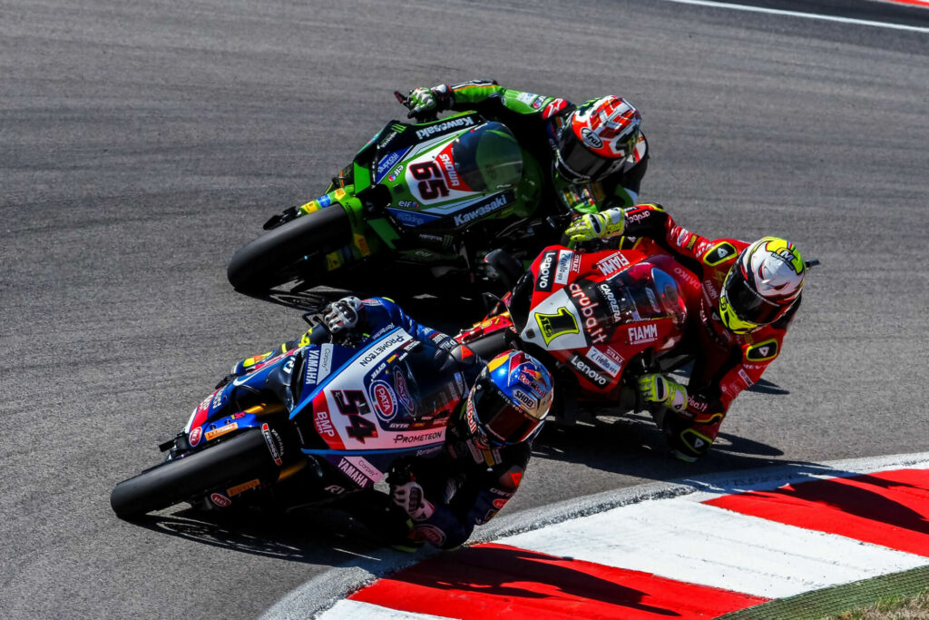 Toprak Razgatlioglu (54), Alvaro Bautista (1), and Jonathan Rea (65) battling during Race One. Photo courtesy Dorna.