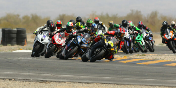 Action from a Ryder Gear Supersport Open race in April 2023 with David Anthony (25) leading Corey Alexander (23), Igor Sokolov (95), Anthony Norton (2), Jason Martinez (245), and the rest of the field. Photo by CaliPhotography, courtesy CVMA.
