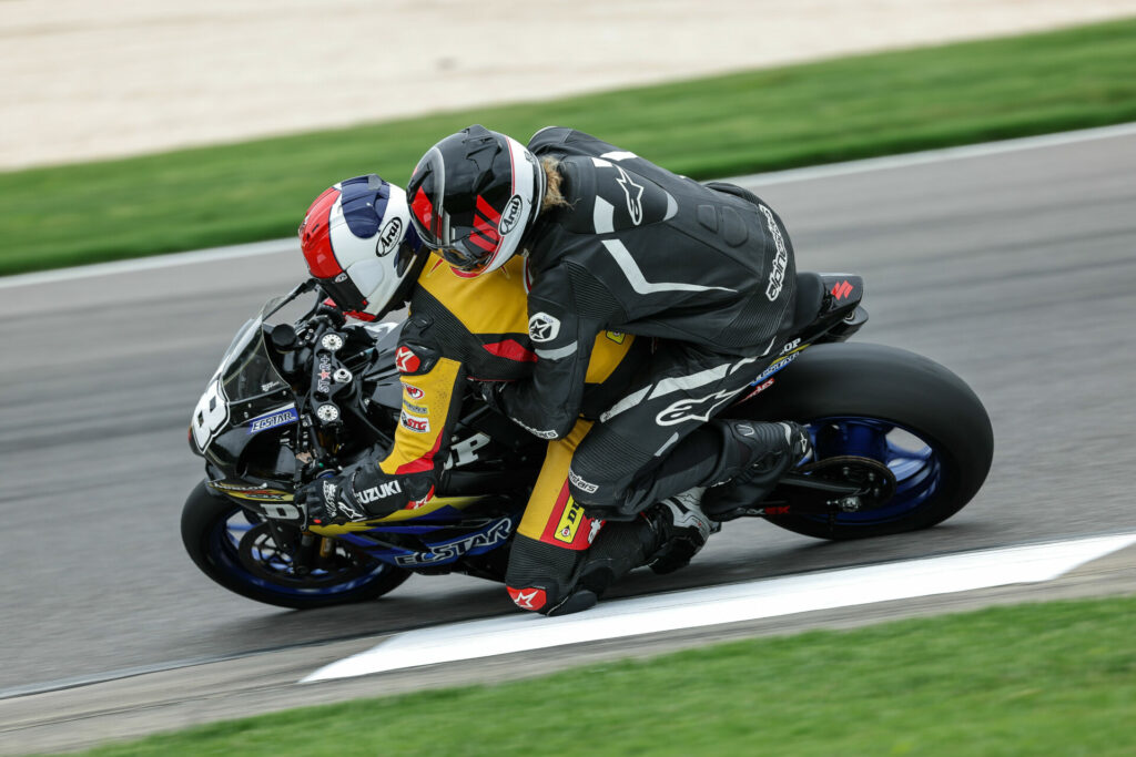 Chris Ulrich giving a ride on the Dunlop ECSTAR Suzuki GSX-R1000R Superbike earlier this season. Photo by Brian J. Nelson.