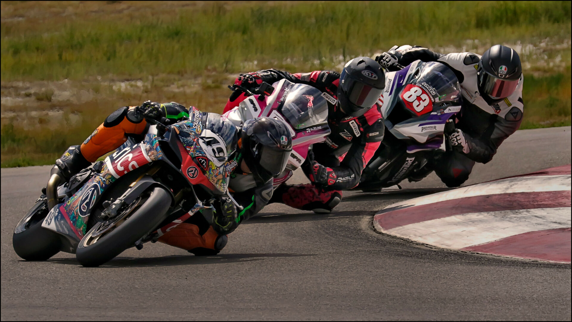 Brian Childree (49) leads the pack on his way to victory in the UtahSBA Moto United/Moto Station King of the Mountains race at Utah Motorsports Campus. Photo by Steve Midgley, courtesy UtahSBA.
