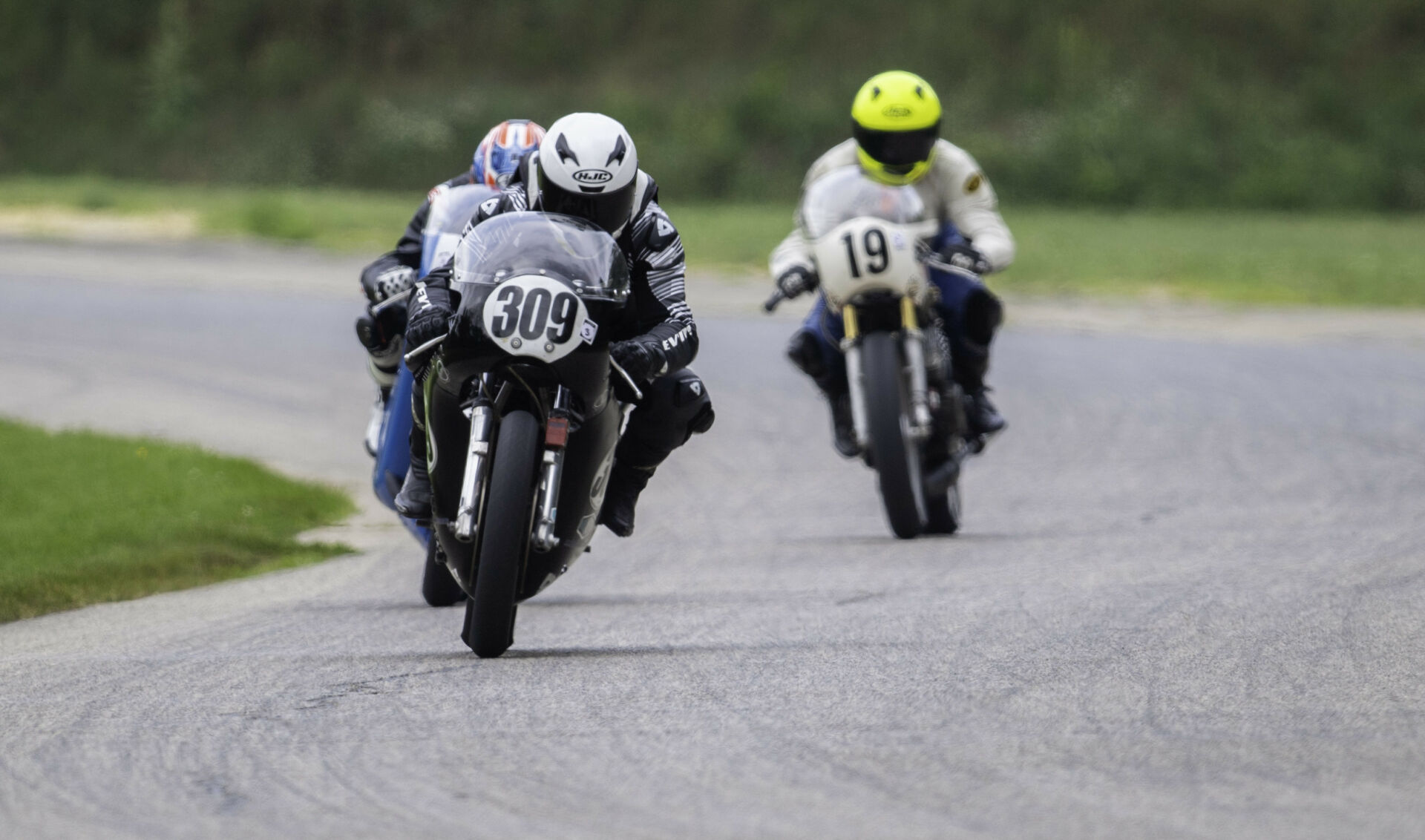 Tim Joyce (309), Shane Turpin (hidden behind Joyce), and Christopher Spargo (19) during an AHRMA Vintage Cup race earlier this season at Blackhawk Farms Raceway. Photo by Cathy M. Drexler. courtesy AHRMA.