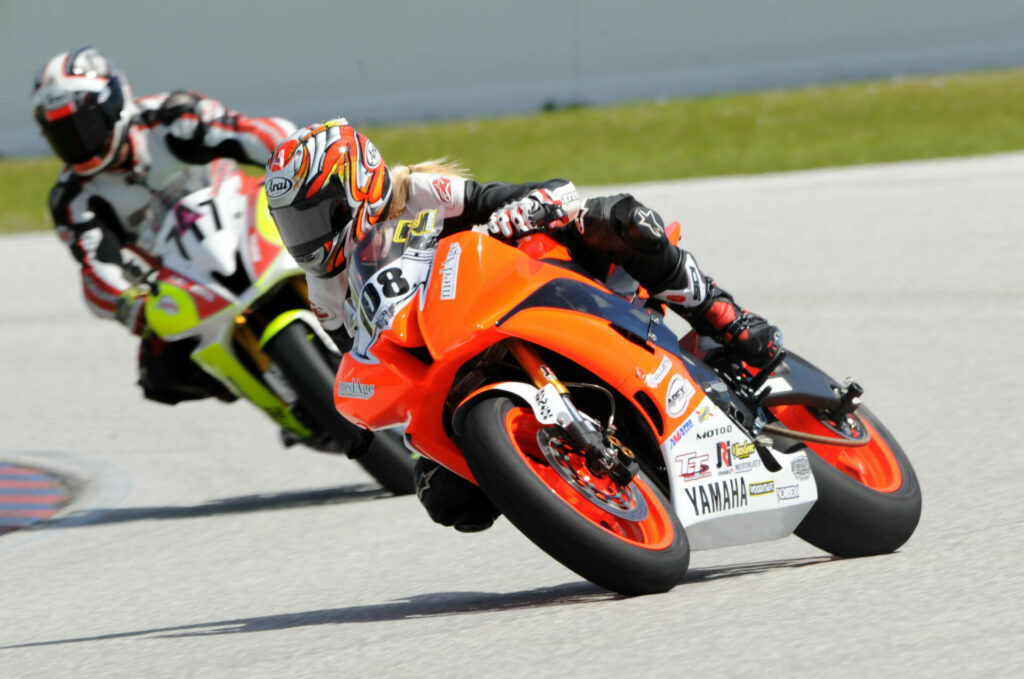 Dr. Laura Ellis (108) on track aboard her Yamaha YZF-R6. Photo by Lisa Theobald. 