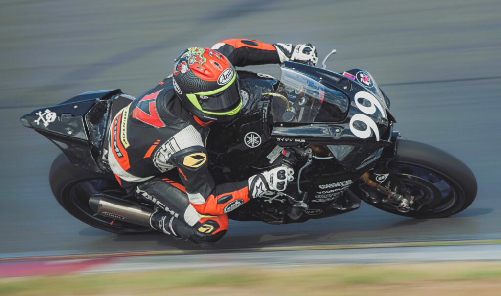 Hunter Dunham (99) piloting the AOD R1 to the podium at Summit Point. Photo by Vae Vang/Noiseless Productions, courtesy Army of Darkness.