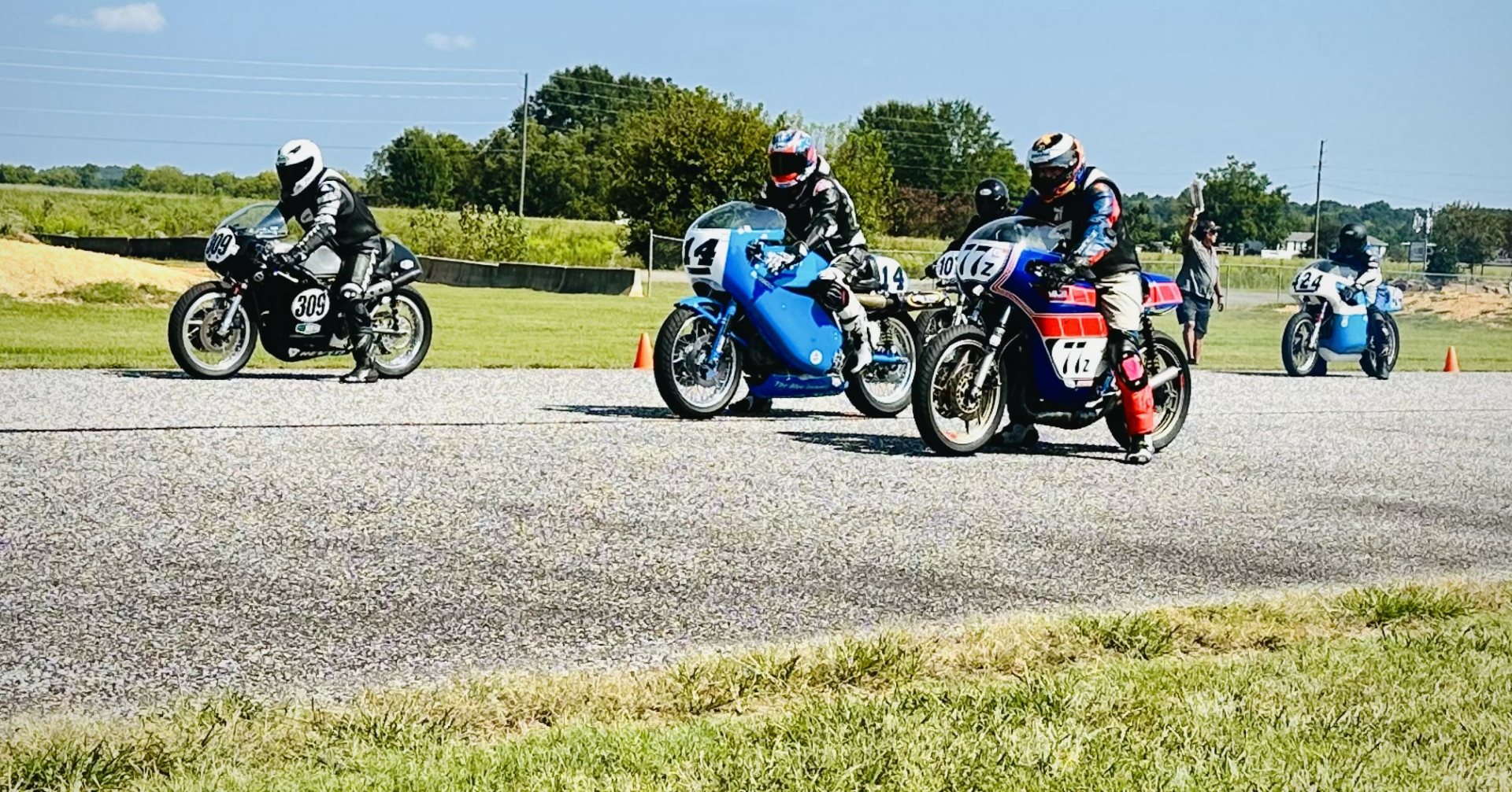 Tim Joyce (309), Shane Turpin (14), Dan Sokolich (77Z), Al Charles (424), and Justin Hebbel (107) prepare for the start of an AHRMA Vintage Cup race at Talladega Gran Prix Raceway. Photo by Kenny Cummings, courtesy AHRMA.