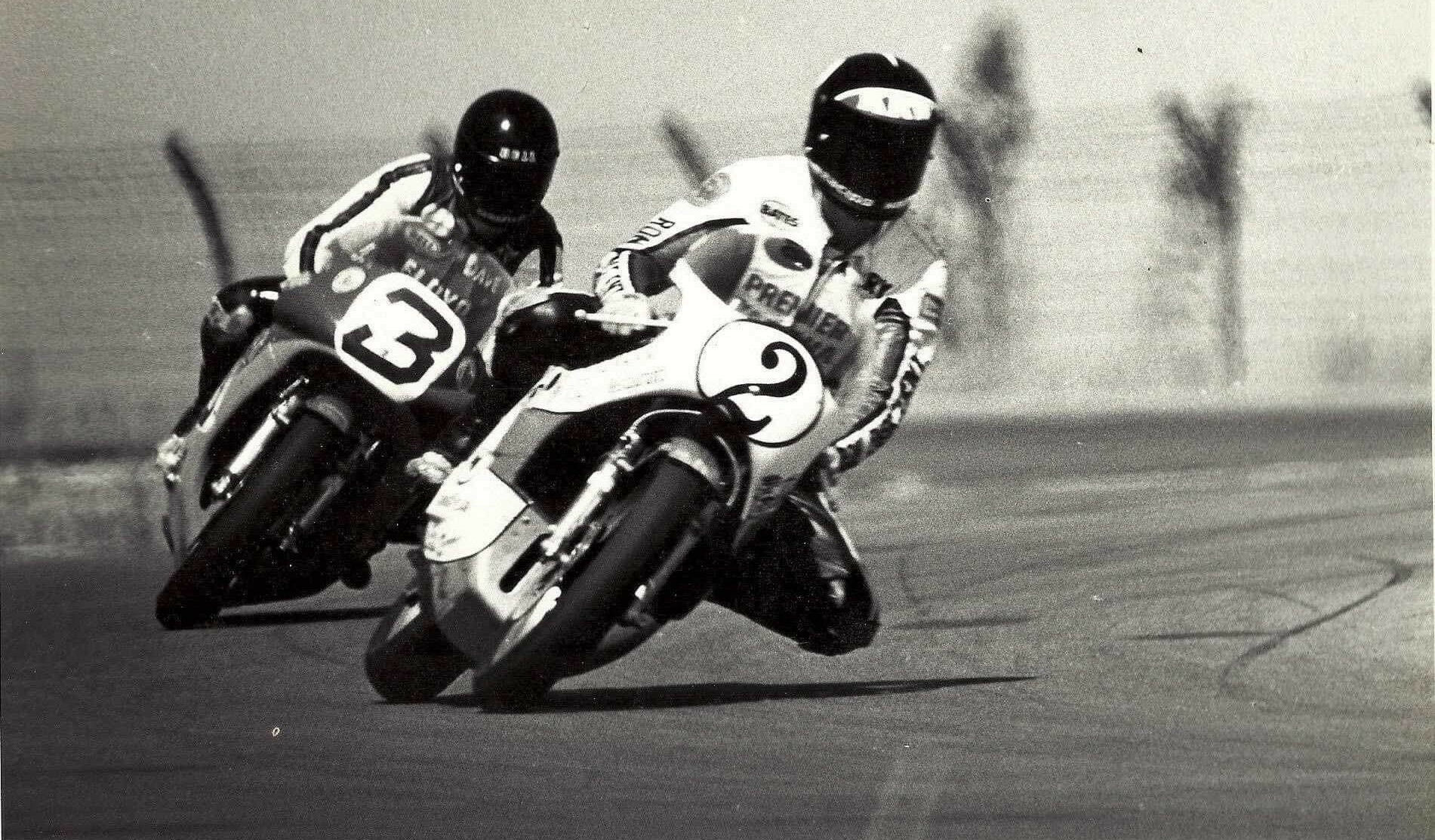 Harry Klinzmann (2) racing with David Emde (3) on Yamaha TZ750s at Ontario Motor Speedway circa mid-to-late 1970s. Photo of an old print photo by John Ulrich/courtesy Harry Klinzmann.