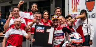Jake Dixon and his Inde GASGAS Aspar Team celebrate his Moto2 pole position in parc ferme in India. Photo courtesy Aspar Team.