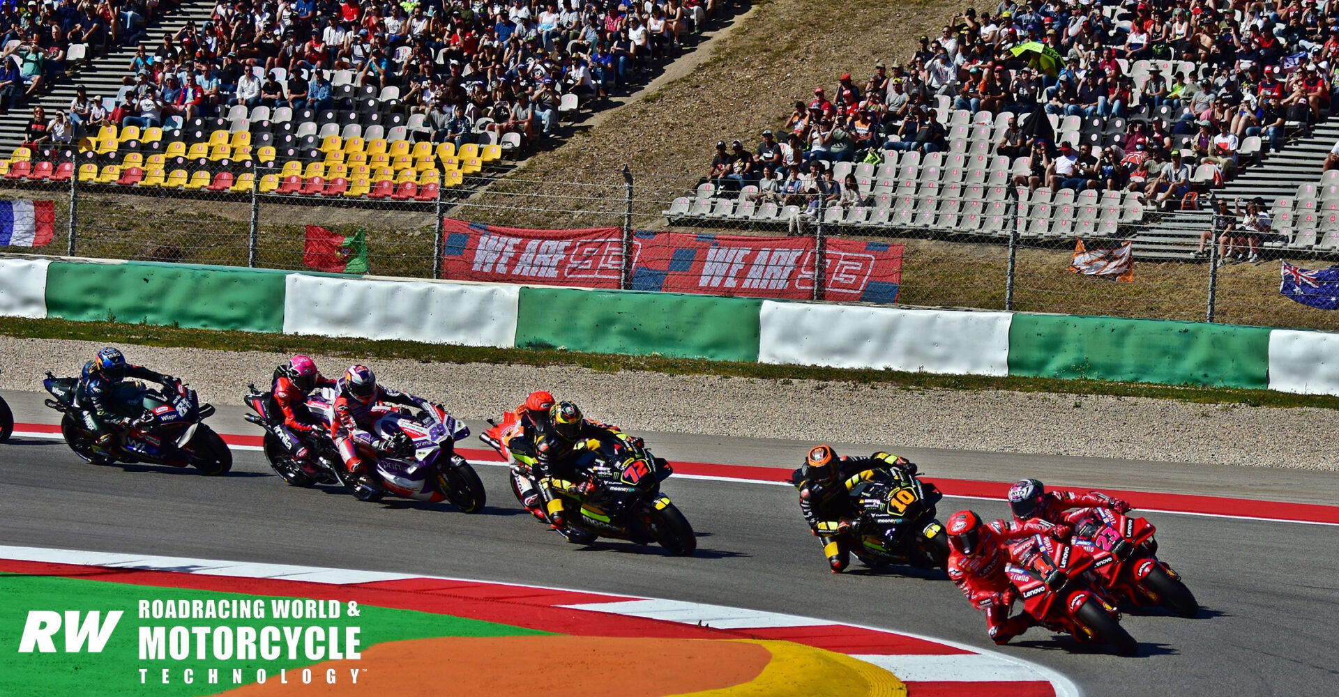 Start of the MotoGP Sprint race at Autodromo do Algarve at the beginning of the 2023 season, with Francesco Bagnaia (1) leading Enea Bastianini (23), Luca Marini (10), Marco Bezzecchi (72), Marc Marquez (hidden), Jorge Martin (89), Aleix Espargaro (hidden) and Miguel Oliveira. If you purchased a seat in the grandstands overlooking Turn Three at the event, that grandstand was the only place you were allowed to go anywhere on the track without a separate ticket. Photo by Michael Gougis.