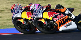 Angel Piqueras (18) and Alvaro Carpe (83) battle for the lead in Race One at Misano. Photo courtesy Red Bull.