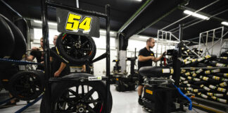 Pirelli tires being fitted during a test Monday at Circuit de Barcelona-Catalunya. Photo courtesy Pirelli.