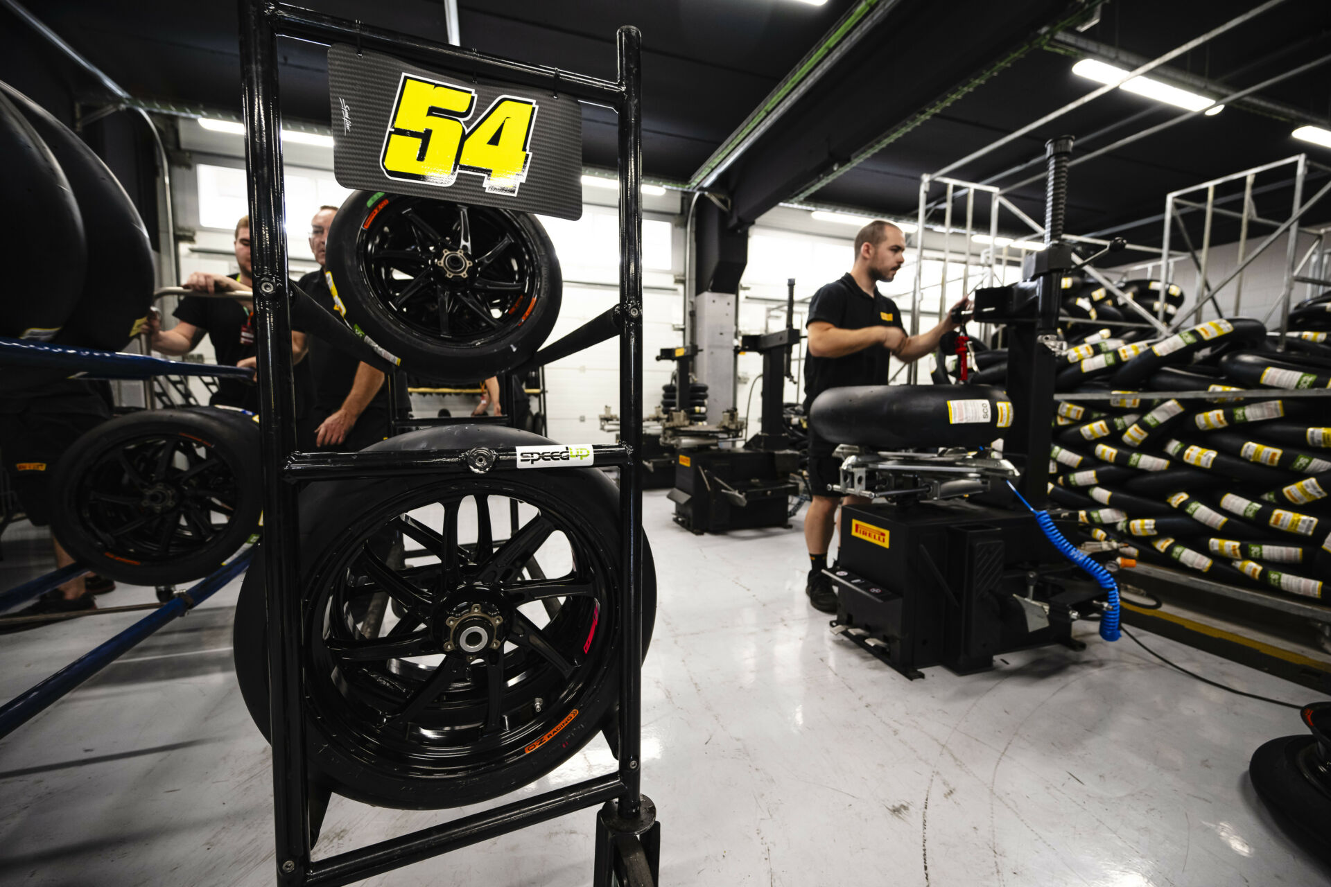 Pirelli tires being fitted during a test Monday at Circuit de Barcelona-Catalunya. Photo courtesy Pirelli.