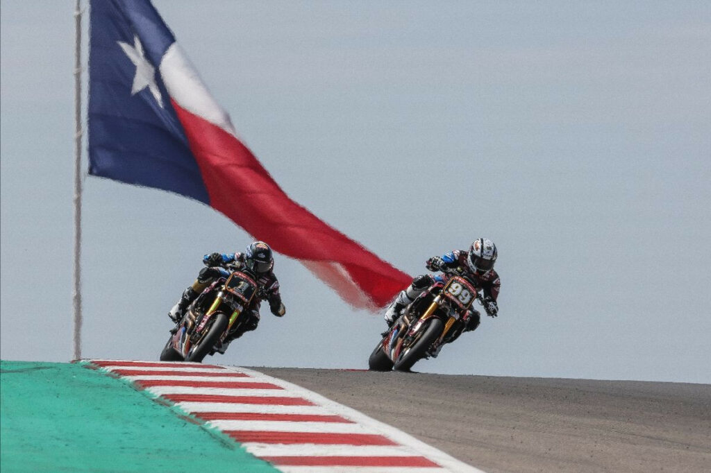 Jeremy McWiliams (99) and Tyler O'Hara (1) battled to the last corner in the Mission Super Hooligans race at COTA when McWilliams crashed out, handing victory and the title to O'Hara. Photo by Brian J. Nelson.