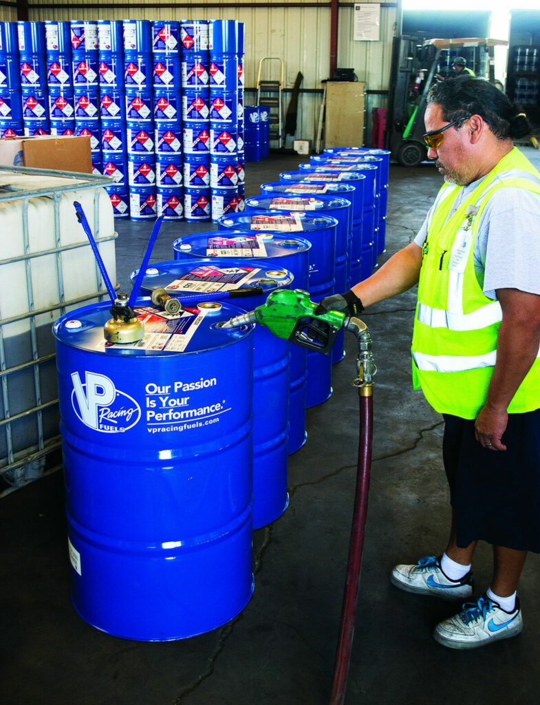 Finished VP Racing Fuels are pumped into specially-coated drums, including 55-gallon drums seen here. Photo by David Swarts.