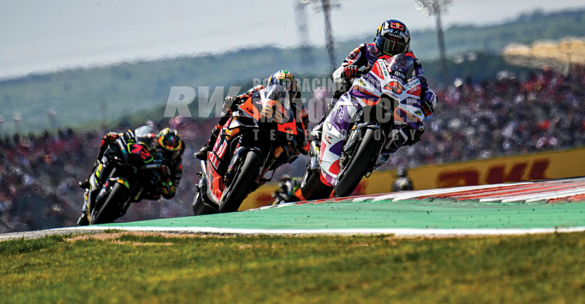 Johann Zarco (5) battles Brad Binder (33) and Marco Bezzecchi (72) at COTA. Photo by Gigi Soldano/DPPI Media.