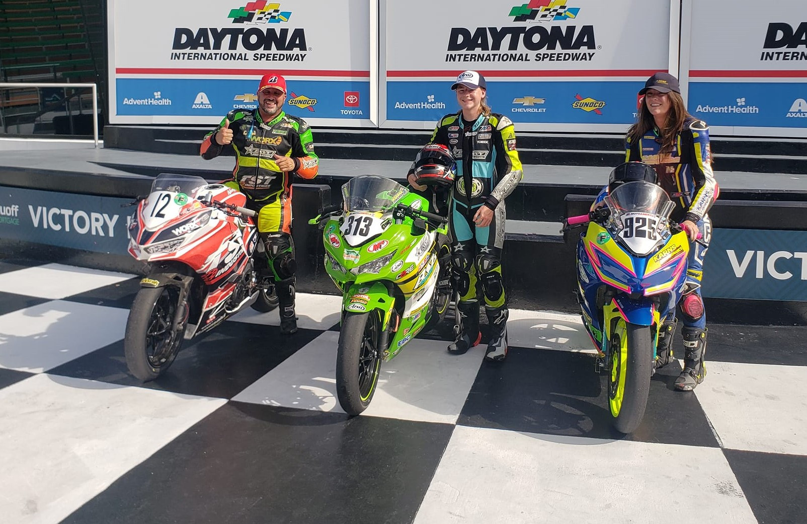 Trenton Keesee (center) after winning the ASRA 400 National at Daytona over runner-up Alex Ferreira (left) and third-place finisher Elisa Gendron-Belen (right). Photo courtesy Bruce Gendron.