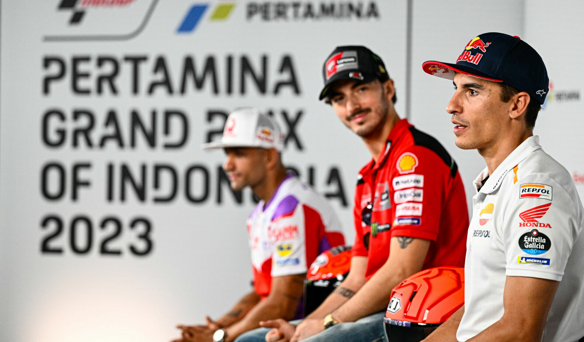 Marc Marquez (right) speaks at the pre-event press conference in Indonesia while Francesco Bagnaia (center) and Jorge Martin (left) listen. Photo courtesy Dorna.