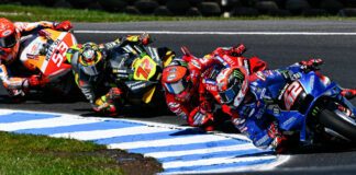 Alex Rins (42) leading Francesco Bagnaia, Marco Bezzecchi (72), and Marc Marquez (93) during the MotoGP race at Phillip Island in 2022. Photo courtesy Dorna.