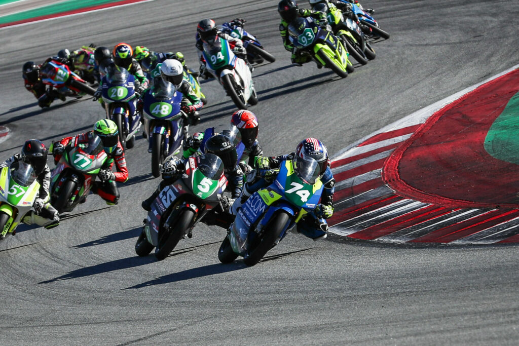 Kensei Matsudaira (74) leading a group of riders during a Moto4 race at Catalunya. Photo by Benaisa Photography, courtesy Evike.com.