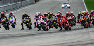 The start of Sunday's MotoGP race at Sepang with Francesco Bagnaia (1) and Jorge Martin (89) fighting for first place heading into Turn One. Photo by Kohei Hirota.