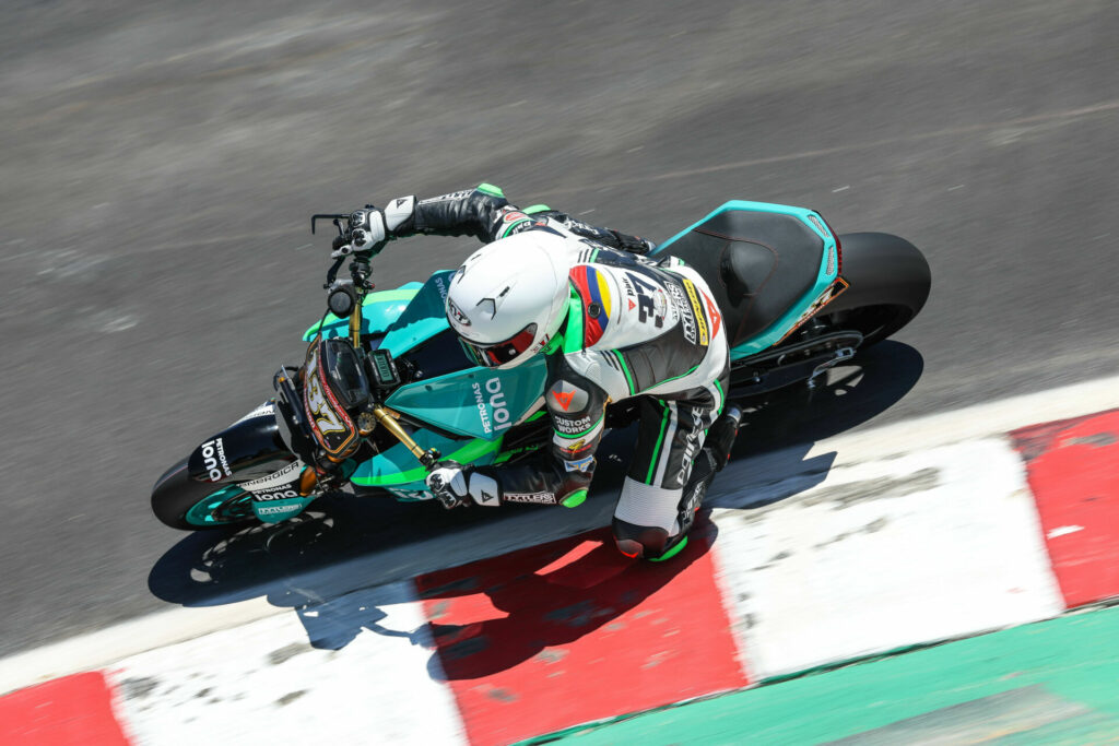 Stefano Mesa (137) at speed on his electric Energica Eva Ribellle RS at Laguna Seca. Photo courtesy Energica.