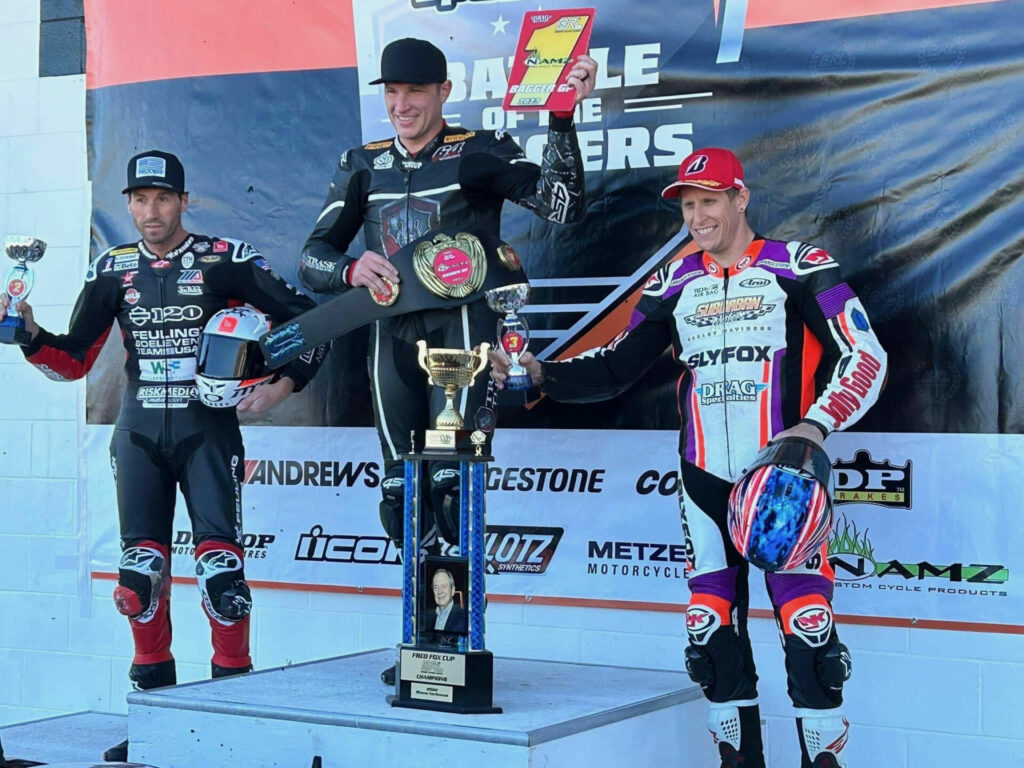 Shane Narbonne (center) won the Bagger Racing League NAMZ Bagger GP race at Willow Springs and the Championship for a third straight year. He's flanked by race runner-up Ruben Xaus (left) and third-place finisher Jesse Janisch (right). Photo by Larry Mills. 