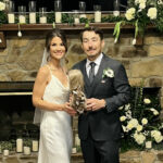 Newlyweds Roger Hayden and Elizabeth Ebelhar. The squirrel they are holding is a tribute to Hayden's late father Earl "The Squirrel" Hayden. Photo courtesy Roger Hayden.
