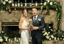 Newlyweds Roger Hayden and Elizabeth Ebelhar. The squirrel they are holding is a tribute to Hayden's late father Earl "The Squirrel" Hayden. Photo courtesy Roger Hayden.