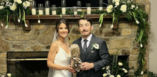 Newlyweds Roger Hayden and Elizabeth Ebelhar. The squirrel they are holding is a tribute to Hayden's late father Earl "The Squirrel" Hayden. Photo courtesy Roger Hayden.