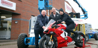 North West 200 Director Mervyn Whyte (left), Briggs Equipment Ireland Managing Director Gary Clements (center), and racer Glenn Irwin. Photo by Stephen Davison, courtesy North West 200 Press Office.