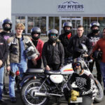 Ride On President Jim Wilson (far left) and Coach Faisal Mustafa (kneeling) with Basic Rider Course students. Photo courtesy Ride On.
