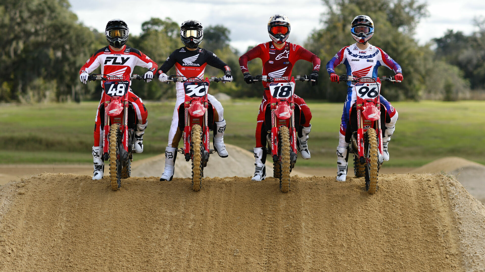 Team Honda HRC 250 riders Chance Hymas (48) and Jo Shimoda (30) and Team Honda HRC 450 riders Jett Lawrence (18) and Hunter Lawrence (96). Photo courtesy American Honda.