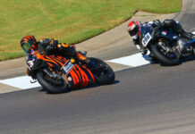 AHRMA racers Steve Metz (13W) and Gus Rodio (296) at the Barber Vintage Festival. Photo by etechphoto.com, courtesy AHRMA.