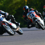 AHRMA racers Joe Ackley (709), Wes Orloff (74), and Maxon McLaughlin (713) at speed at Barber Motorsports Park. Photo by etechphoto.com, courtesy AHRMA.