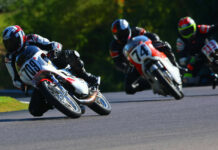 AHRMA racers Joe Ackley (709), Wes Orloff (74), and Maxon McLaughlin (713) at speed at Barber Motorsports Park. Photo by etechphoto.com, courtesy AHRMA.