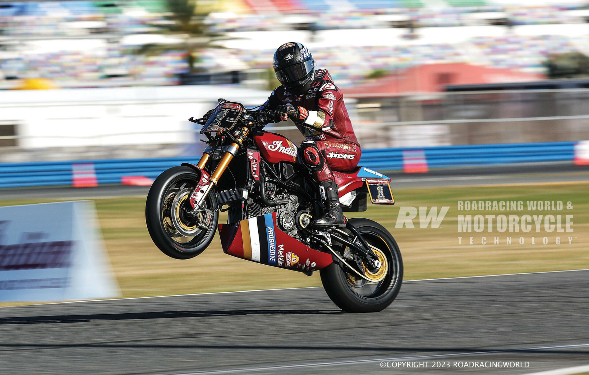 Tyler O'Hara (1) wheelieing his Progressive Insurance/Mission Foods Indian FTR 1200 Super Hooligan racebike at Daytona in 2023. Photo by Brian J. Nelson.