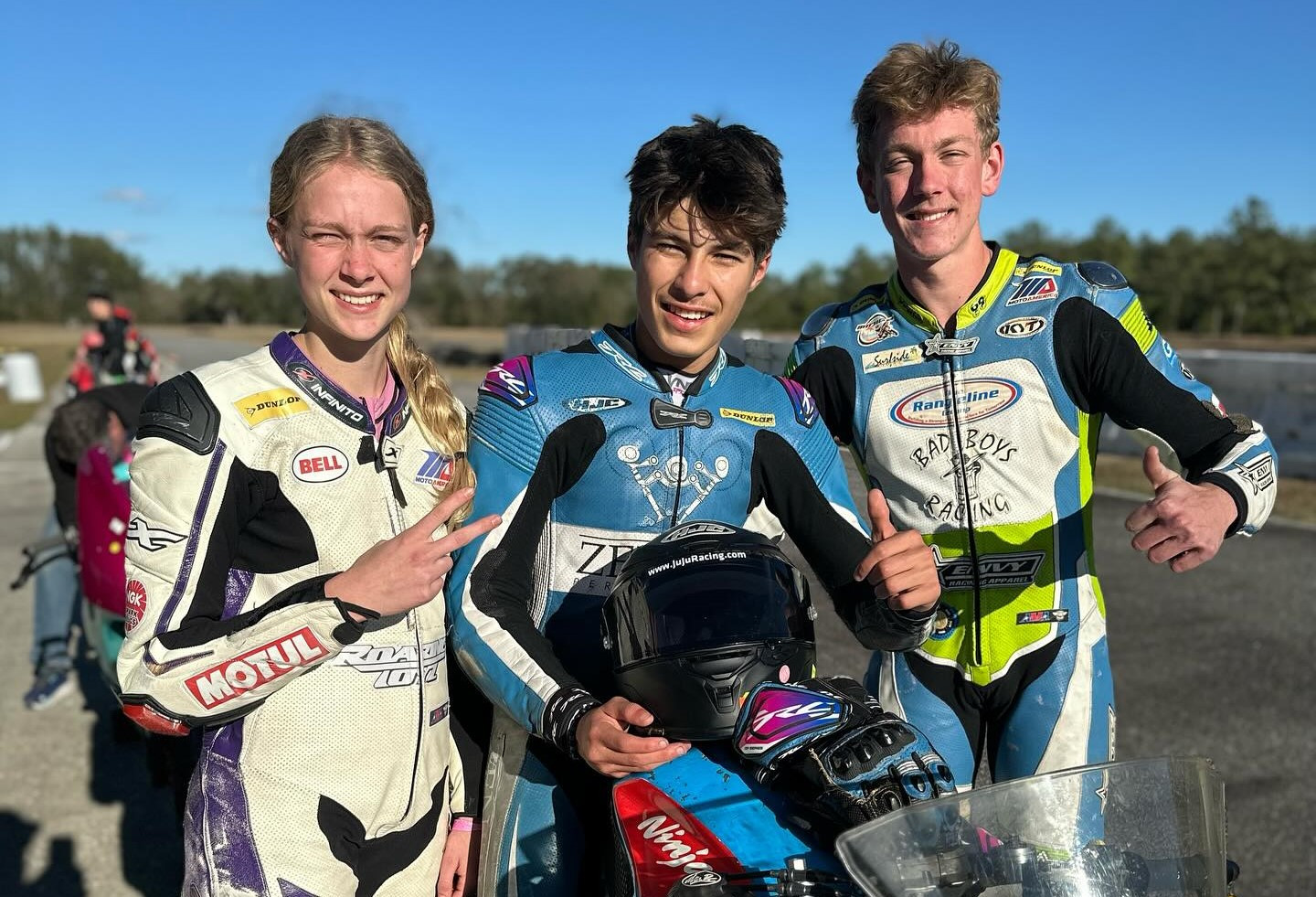 2023 MotoAmerica Junior Cup Champion Avery Dreher (right, age 17), 15-year-old British Talent Cup racer Julian Correa (center), and Dreher's 13-year-old sister Ella (left) took first place overall and in the 400 Super Stock class at the Ceparano Endurance Classic. Photo courtesy Bad Boy Racing.