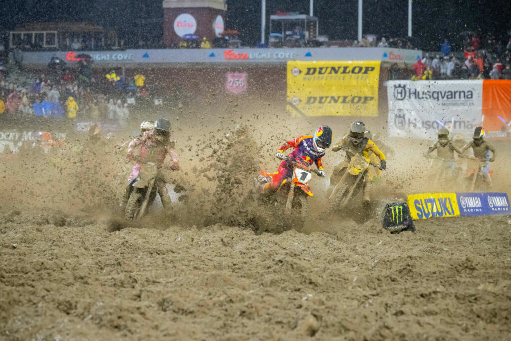 Chase Sexton (1) takes the leads in the 450 SX main event at rainy Oracle Park, in San Francisco, California. Photo courtesy Feld Motor Sports, Inc.