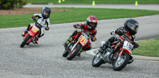 Grober Reyes (19) leads Weston Fager (71) and Cruise Texter (26) during a MotoAmerica Mini Cup Stock 50 race at Barber Motorsports Park in 2023. Photo by Brian J. Nelson.Grober Reyes (19) leads Weston Fager (71) and Cruise Texter (26) during a MotoAmerica Mini Cup Stock 50 race at Barber Motorsports Park in 2023. Photo by Brian J. Nelson.