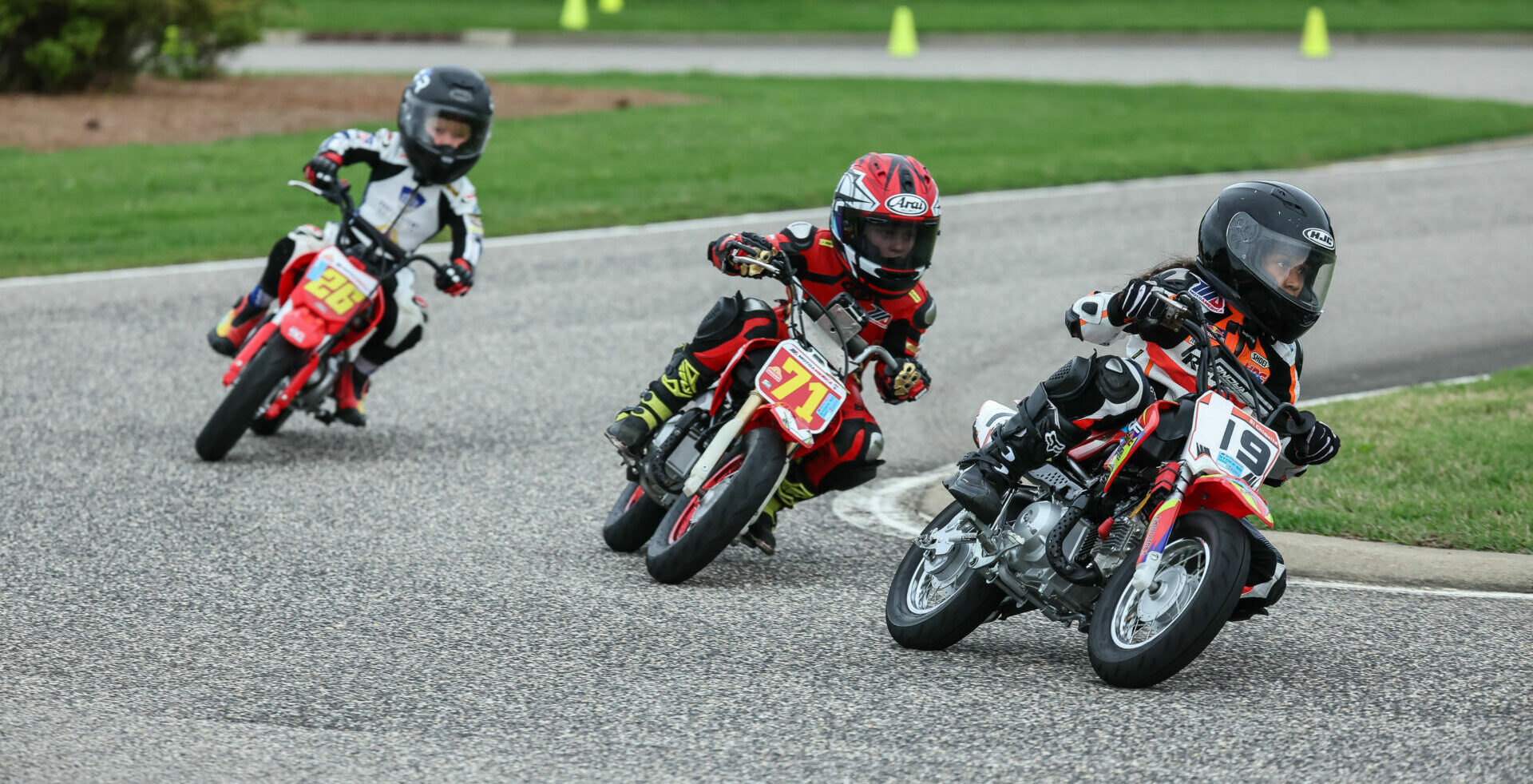 Grober Reyes (19) leads Weston Fager (71) and Cruise Texter (26) during a MotoAmerica Mini Cup Stock 50 race at Barber Motorsports Park in 2023. Photo by Brian J. Nelson.Grober Reyes (19) leads Weston Fager (71) and Cruise Texter (26) during a MotoAmerica Mini Cup Stock 50 race at Barber Motorsports Park in 2023. Photo by Brian J. Nelson.