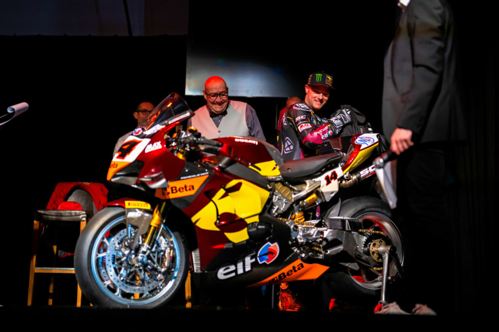 Sam Lowes pulls the cover off his new Ducati Panigale V4 R Superbike to the delight of team owner Marc van der Straten. Photo courtesy Elf Marc VDS Racing Team.
